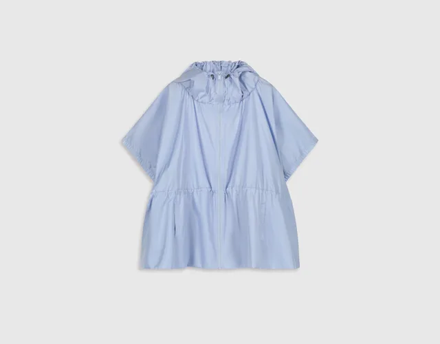 Packshot piqué : blouse bleu ciel à volants