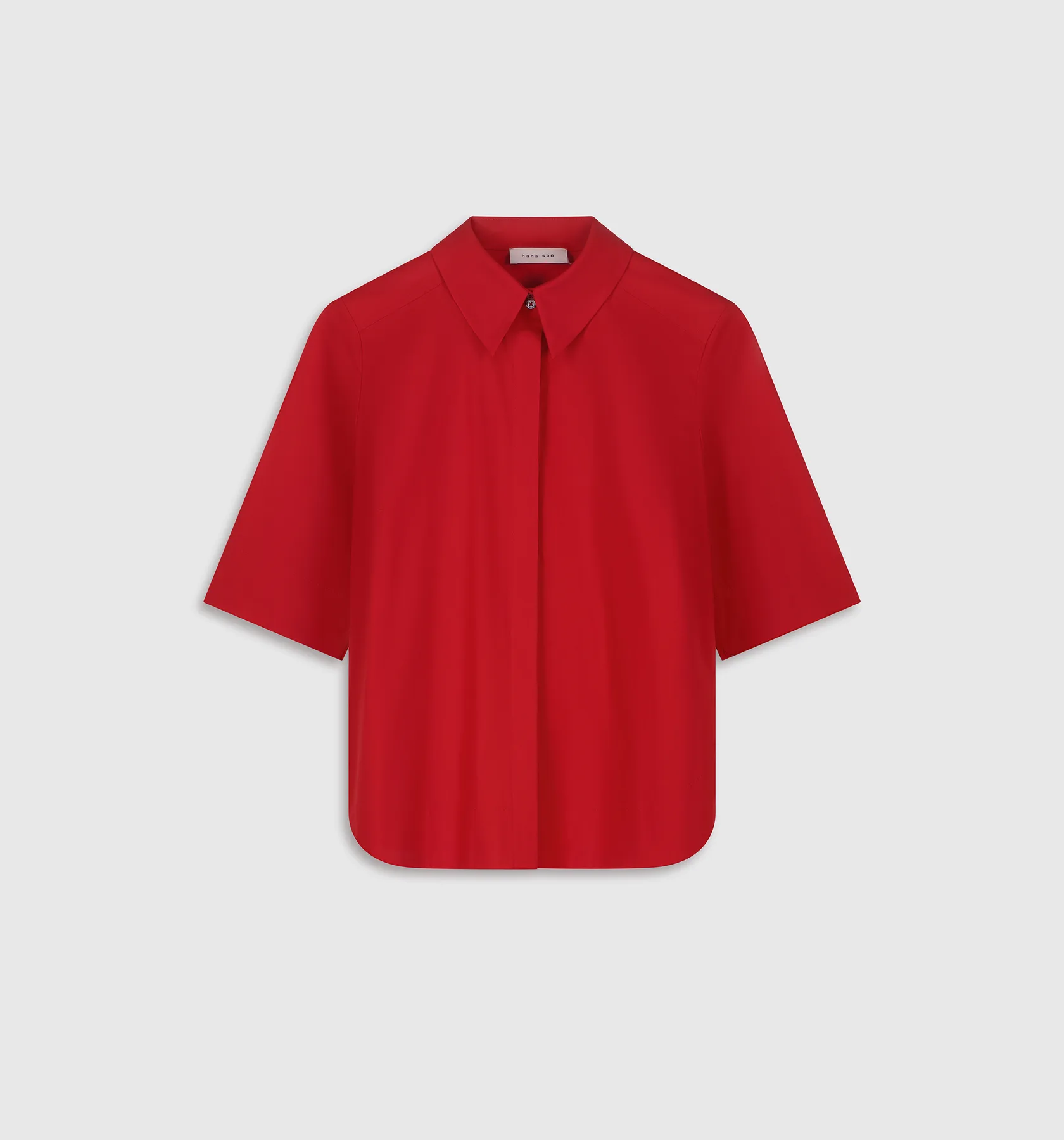 Packshot piqué : chemise rouge à manches courtes
